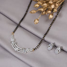 "Elegant zircon mangalsutra in gold, combining traditional charm with modern, dazzling sparkle."
