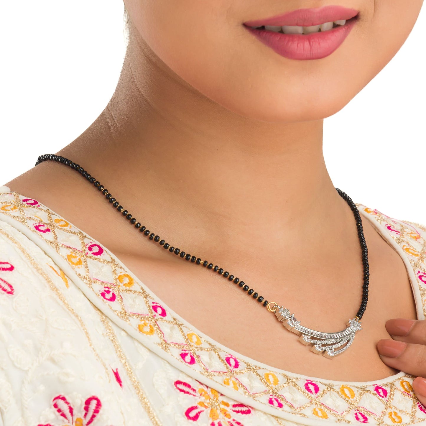 THIS ZIRCON MANGALSUTRA BLENDS TRADITIONAL CHARM WITH RADIANT, MODERN SPARKLE