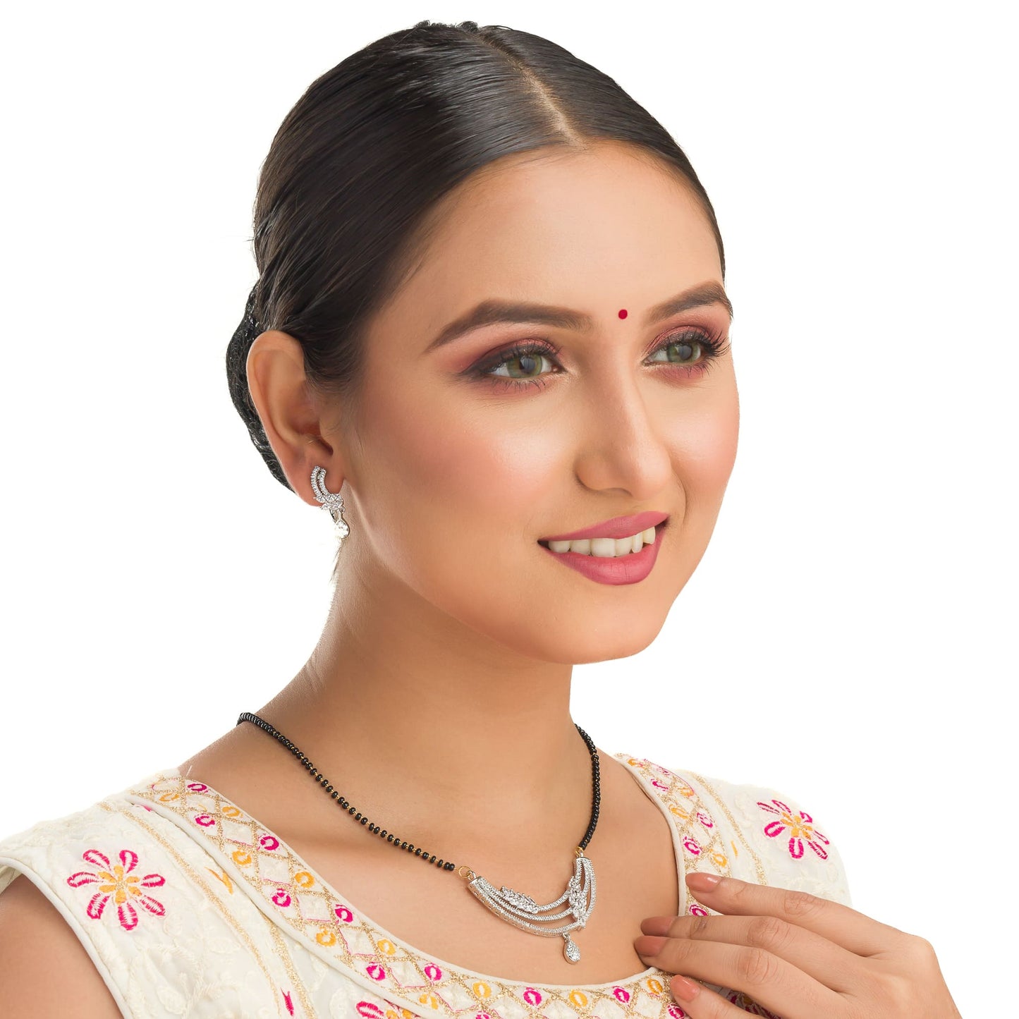 THIS ZIRCON MANGALSUTRA BLENDS TRADITIONAL CHARM WITH RADIANT, MODERN SPARKLE