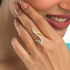 "Modern zircon finger ring in gold, featuring sleek design elements with sparkling elegance."
