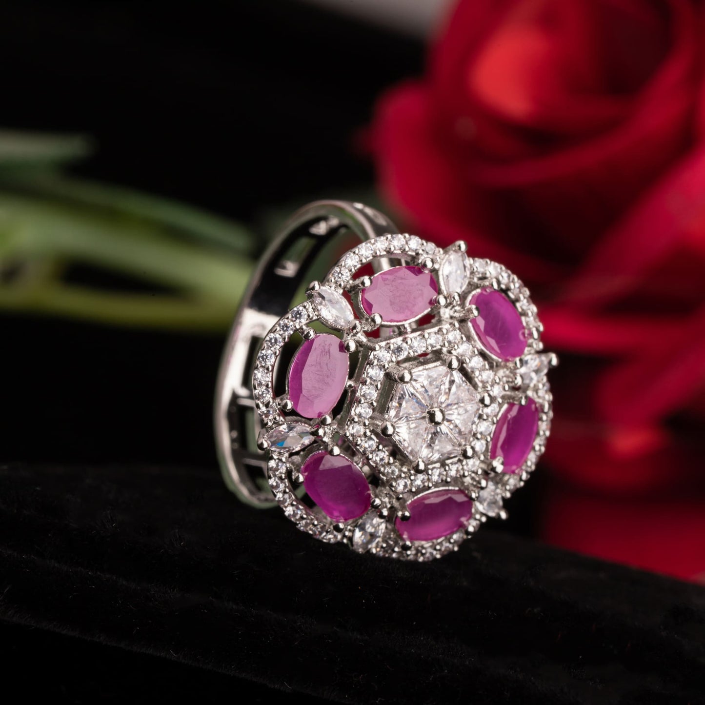 A PINK ZIRCON FINGER RING SHOWCASES VIBRANT COLOR AND SPARKLING ELEGANCE, ADDING A TOUCH OF ROMANCE AND SOPHISTICATION.