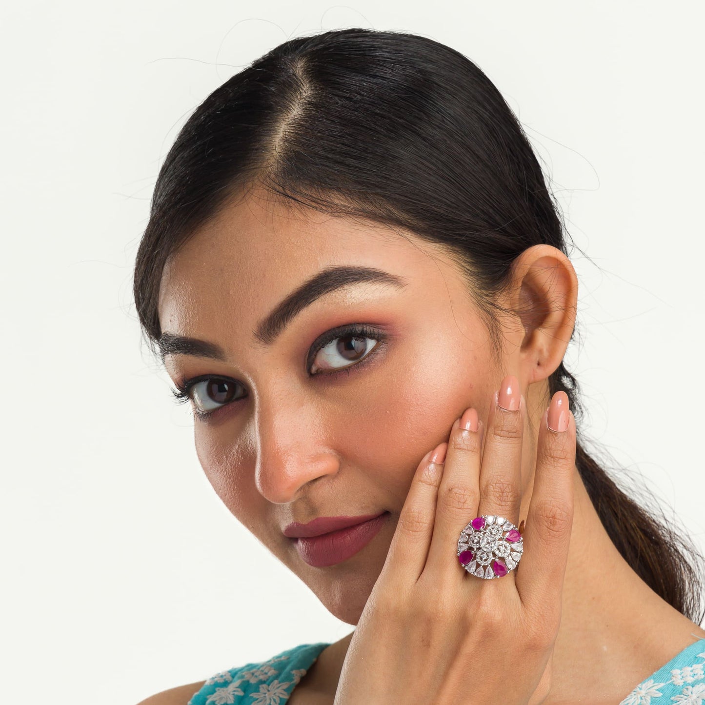 A PINK ZIRCON FINGER RING SHOWCASES VIBRANT COLOR AND SPARKLING ELEGANCE, ADDING A TOUCH OF ROMANCE AND SOPHISTICATION.