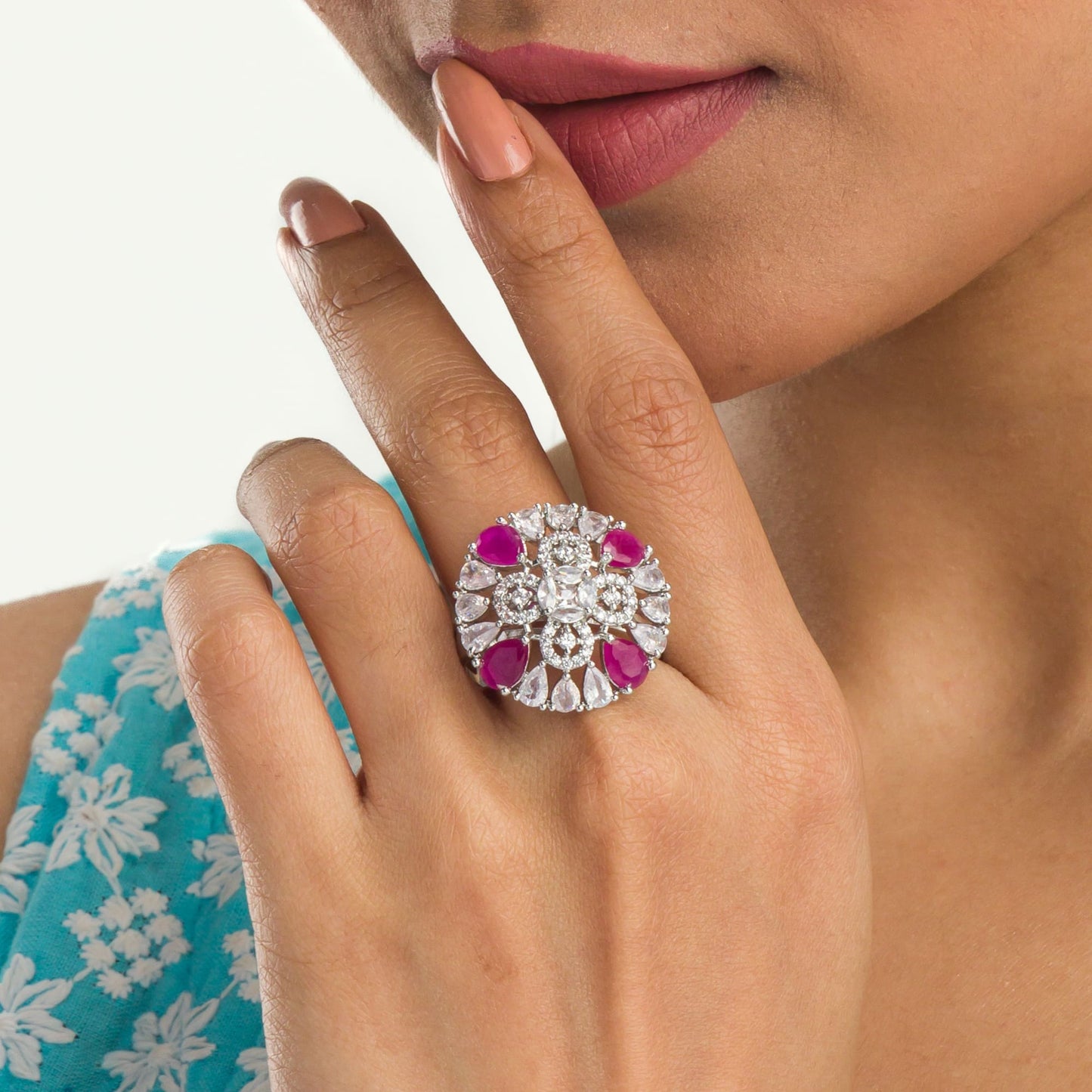 A PINK ZIRCON FINGER RING SHOWCASES VIBRANT COLOR AND SPARKLING ELEGANCE, ADDING A TOUCH OF ROMANCE AND SOPHISTICATION.