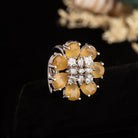 "Yellow zircon finger ring in silver, offering vibrant, sunny brilliance and golden charm for party wear."
