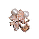 Elegant salmon zircon finger ring with pearls, combining sparkling elegance and soft sophistication."
