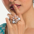 Elegant salmon zircon finger ring with pearls, combining sparkling elegance and soft sophistication."
