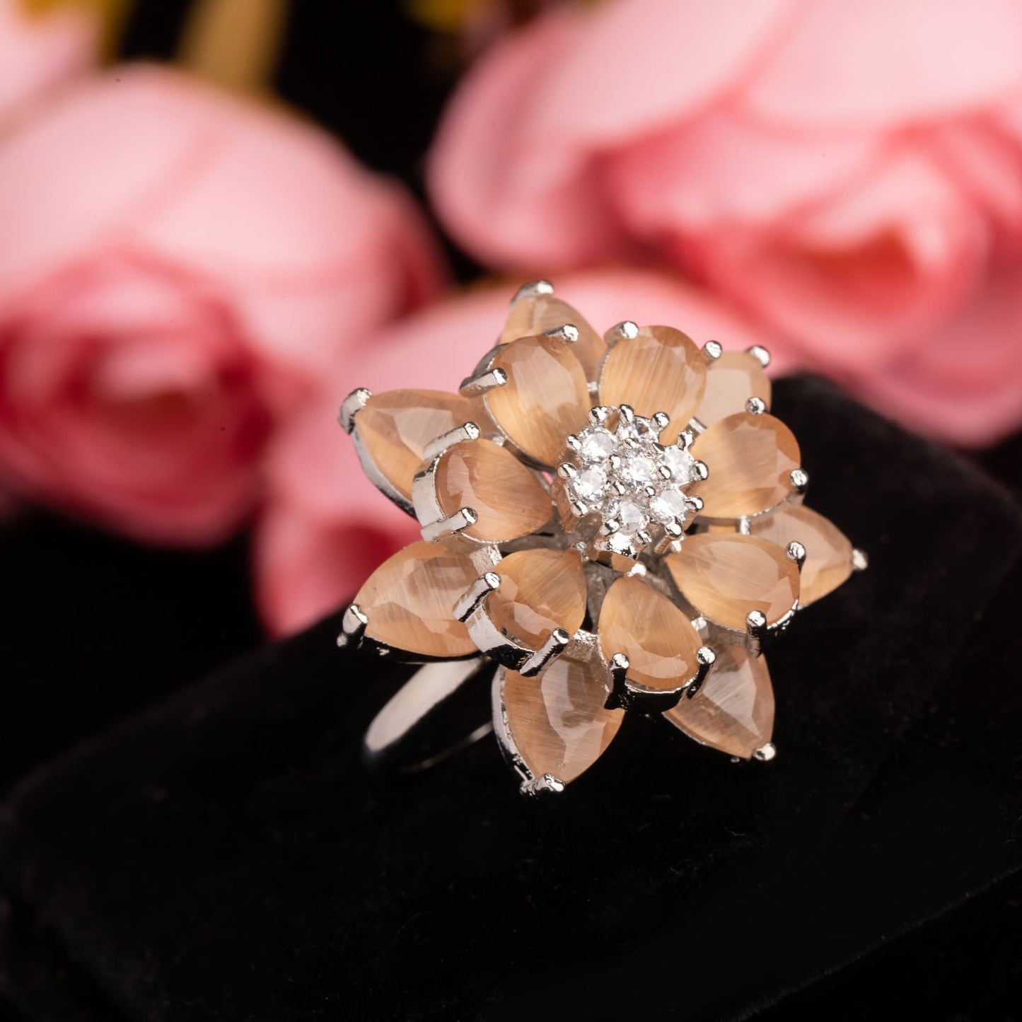 SALMON ZIRCON FINGER RING OFFERS A WARM, RADIANT GLOW WITH ITS UNIQUE, ROSY HUE.