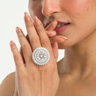 "Zircon finger ring in silver dazzles with vibrant, diamond-like sparkle for party wear."
