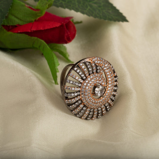 A ROSE GOLD RING WITH ZIRCON AND BLACK ACCENTS BLENDS ELEGANCE WITH DRAMATIC FLAIR.