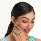 "Salmon zircon finger ring with a flower design combines sparkling elegance and soft, floral charm."
