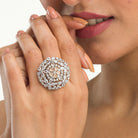 "Salmon zircon finger ring with a flower design combines sparkling elegance and soft, floral charm."
