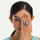 "Rose gold dark blue zircon ring combines luxurious hues with deep sapphire allure for party wear."
