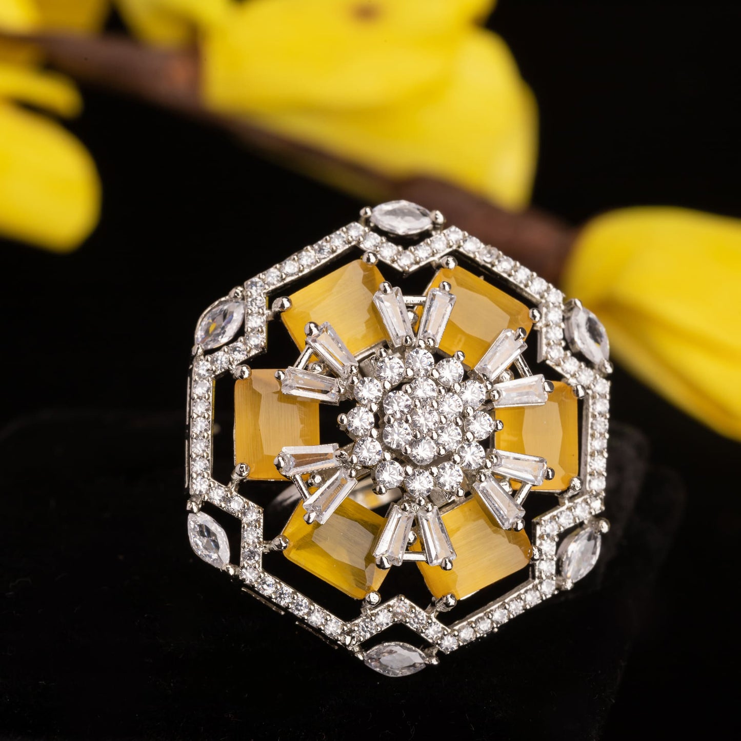 "YELLOW ZIRCON FINGER RING RADIATES VIBRANT, EYE-CATCHING BRILLIANCE."