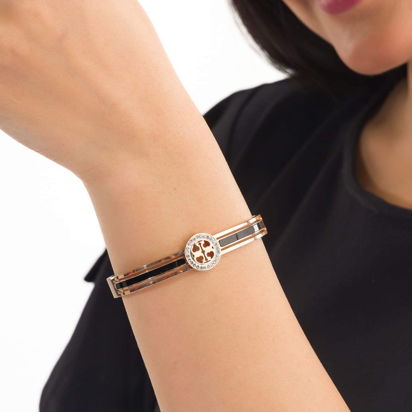 "A ZIRCON BRACELET WITH ROSE GOLD POLISH OFFERS A SOPHISTICATED BLEND OF SPARKLE AND WARMTH."