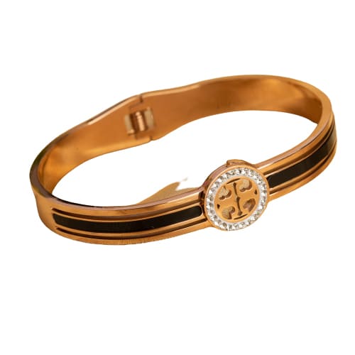 "A ZIRCON BRACELET WITH ROSE GOLD POLISH OFFERS A SOPHISTICATED BLEND OF SPARKLE AND WARMTH."