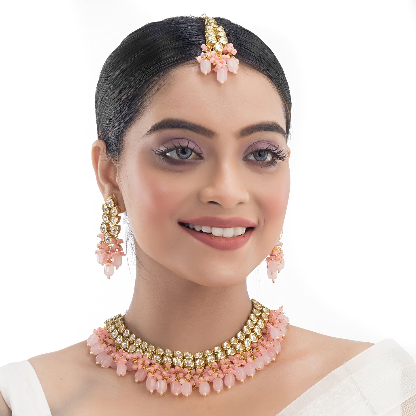 DOUBLE LAYER STUNNING KUNDAN BRIDAL SET WITH PINK PEARLS, INCLUDING MATCHING EARRINGS AND MAANGTIKA.