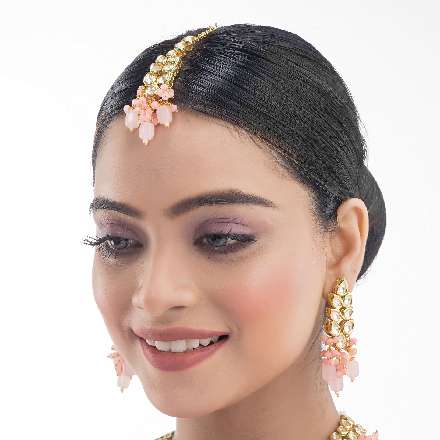 DOUBLE LAYER STUNNING KUNDAN BRIDAL SET WITH PINK PEARLS, INCLUDING MATCHING EARRINGS AND MAANGTIKA.