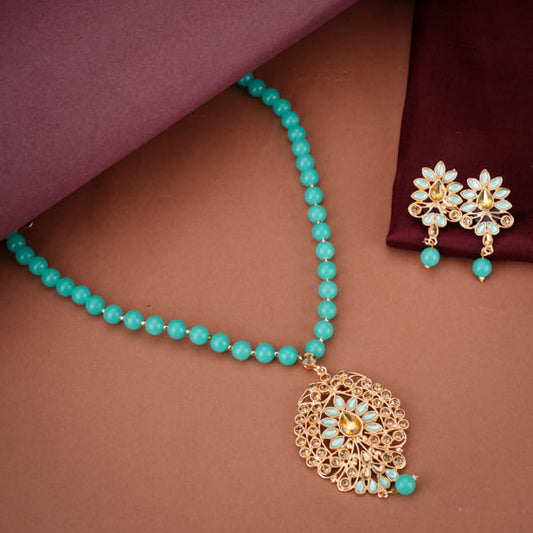 BLUE COLOR PEARL NECKLACE SET WITH KUNDAN STUDDED DETAILS.