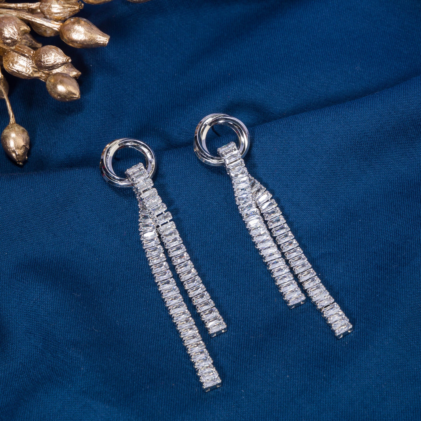 "SILVER ZIRCON SPARKLES EARRINGS  WITH A SLEEK, MODERN BRILLIANCE."