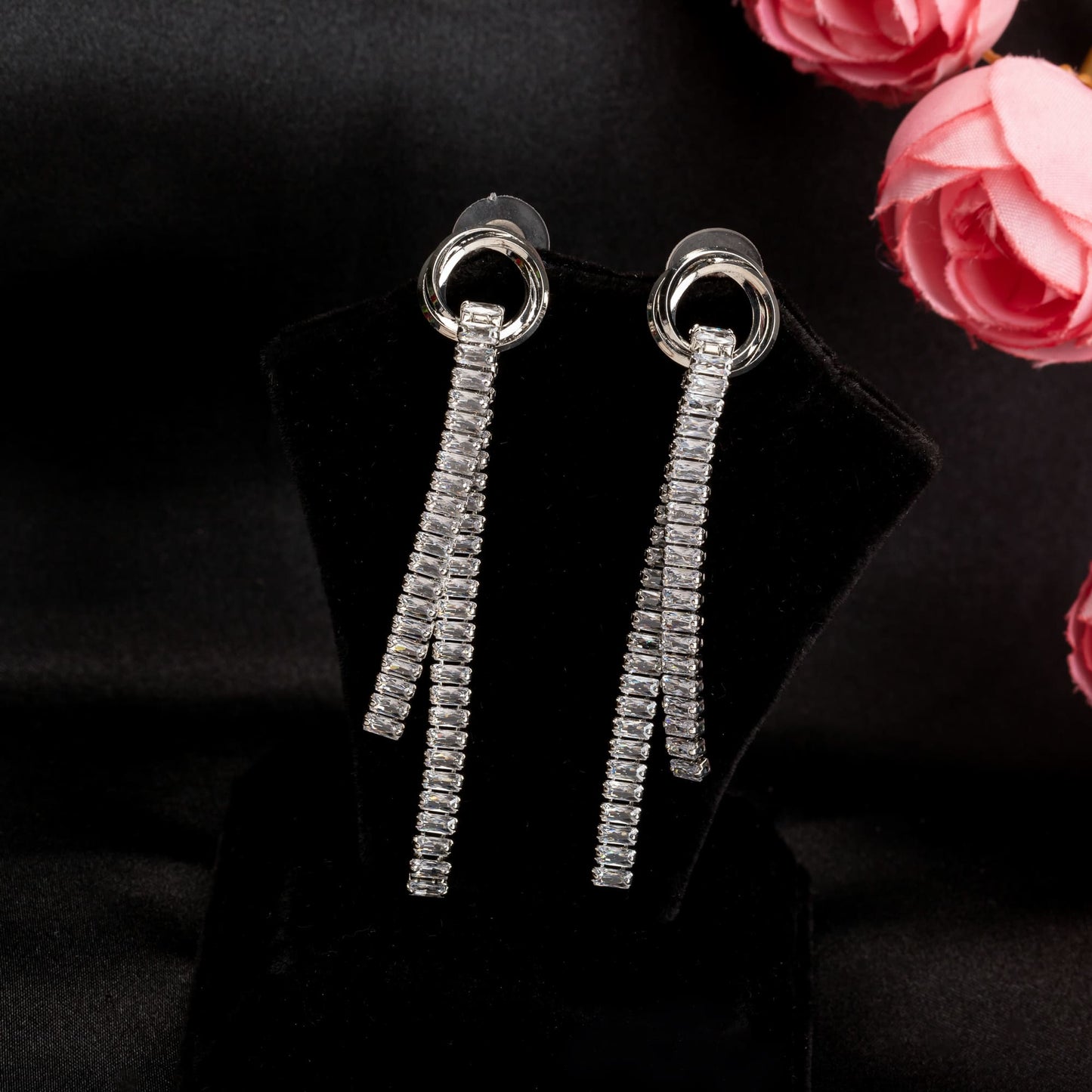 "SILVER ZIRCON SPARKLES EARRINGS  WITH A SLEEK, MODERN BRILLIANCE."