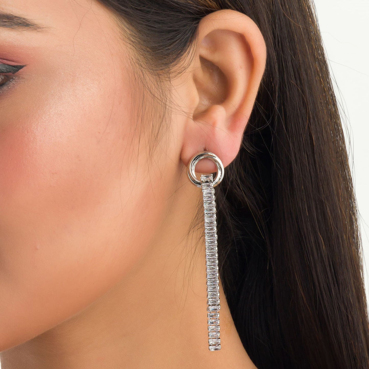 "SILVER ZIRCON SPARKLES EARRINGS  WITH A SLEEK, MODERN BRILLIANCE."