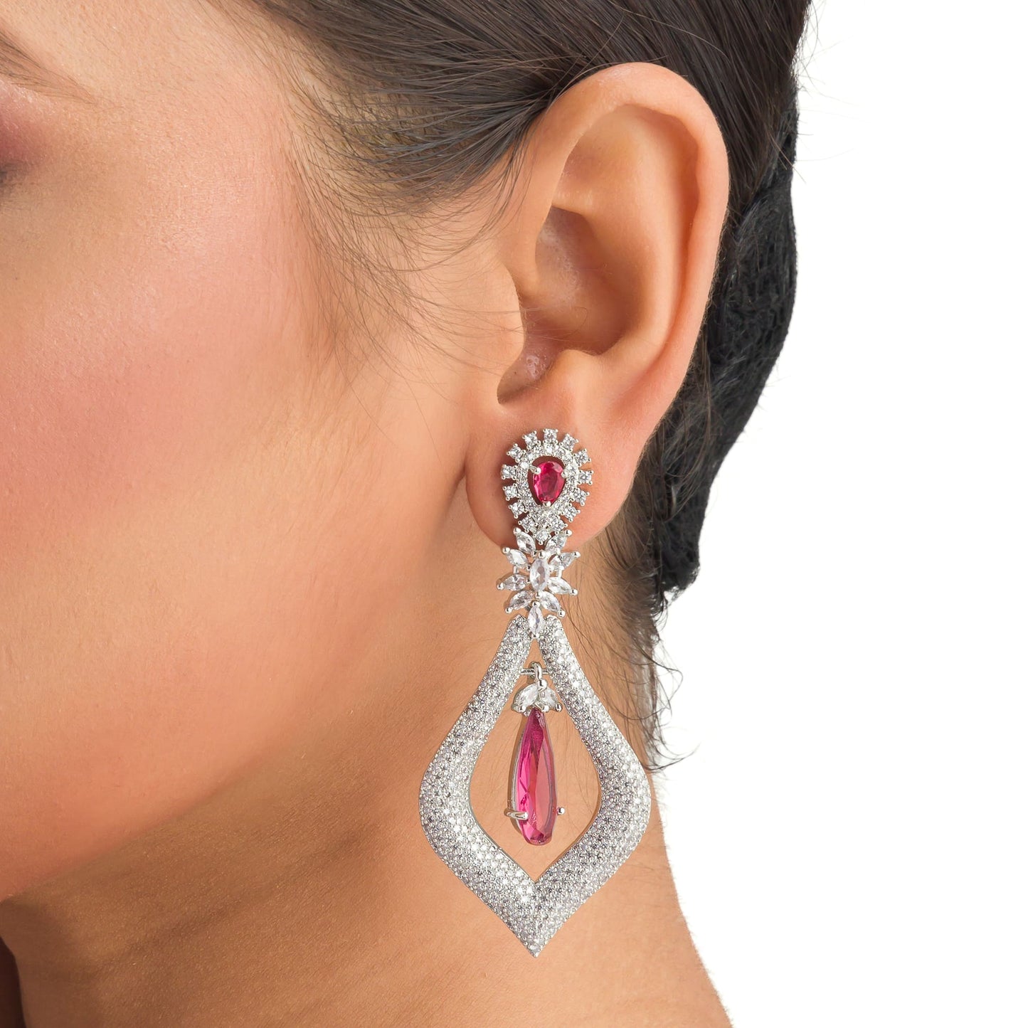 WHITE AND RED ZIRCON TOGETHER CREATE A STRIKING CONTRAST OF SPARKLE AND BOLD COLOR."