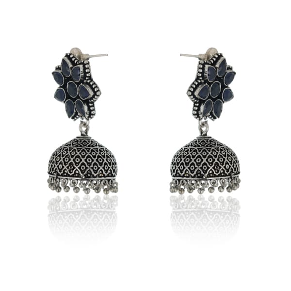 ADD A TOUCH OF ELEGANCE WITH THESE BLUE STONES STUDDED OXIDIZED JHUMKAS. FEATURING A BEAUTIFUL FLOWER DESIGN, T