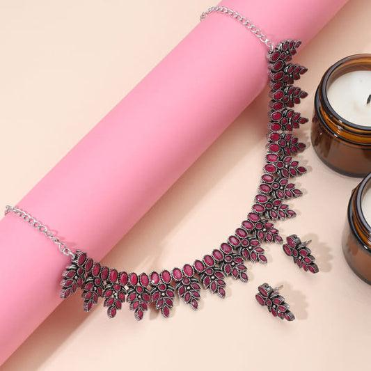 ADD A TOUCH OF ELEGANCE WITH THIS PINK STONES STUDDED OXIDIZED NECKLACE SET.