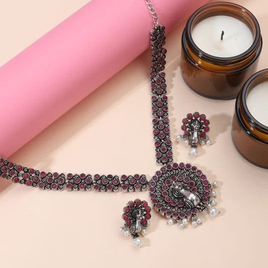 BEAUTIFUL PEACOCK DESIGN CRAFTED NECKLACE SET STUDDED WITH PINK STONES, OFFERING A VIBRANT AND ELEGANT TOUCH