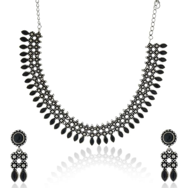 THIS STRIKING OXIDIZED NECKLACE SET FEATURES BLACK STONES FOR A SLEEK, MODERN LOOK.