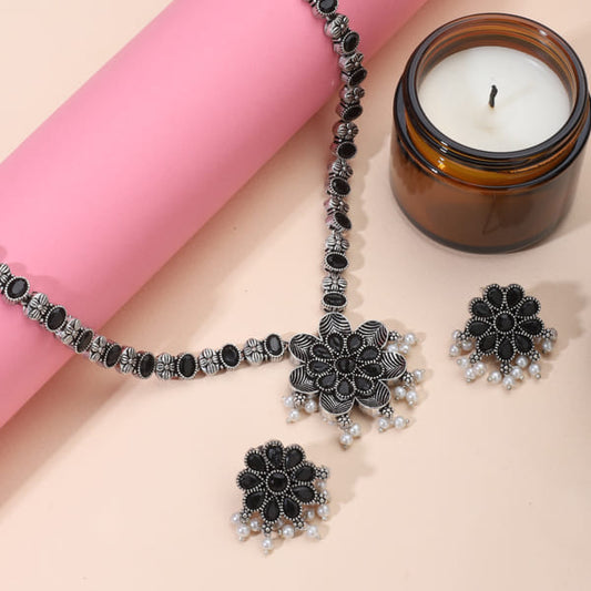 BRIGHTEN YOUR LOOK WITH THIS BLACK STONES STUDDED OXIDIZED LONG NECKLACE SET WITH MATCHING EARRINGBRIGHTEN YOUR LOOK WITH THIS BLACK STONES STUDDED OXIDIZED LONG NECKLACE SET WITH MATCHING EARRING