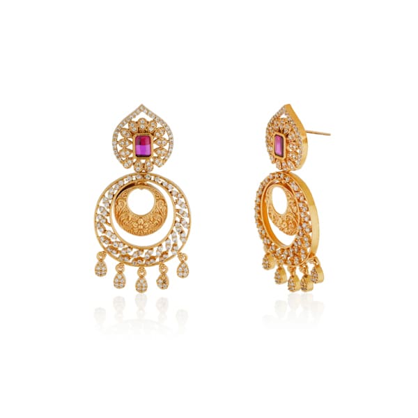 ENHANCE YOUR ELEGANCE WITH THESE ZIRCON STONES STUDDED GOLDTONE EARRINGS.