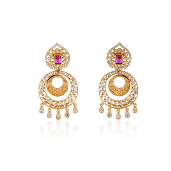 ENHANCE YOUR ELEGANCE WITH THESE ZIRCON STONES STUDDED GOLDTONE EARRINGS.