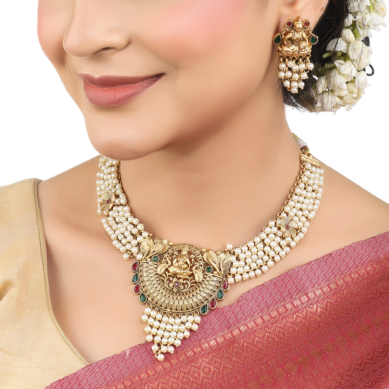 THE LAXMI MAA CRAFTED GOLD-TONE NECKLACE SET WITH WHITE PEARLS COMBINES DIVINE CRAFTSMANSHIP WITH ELEGANT DESIGN.