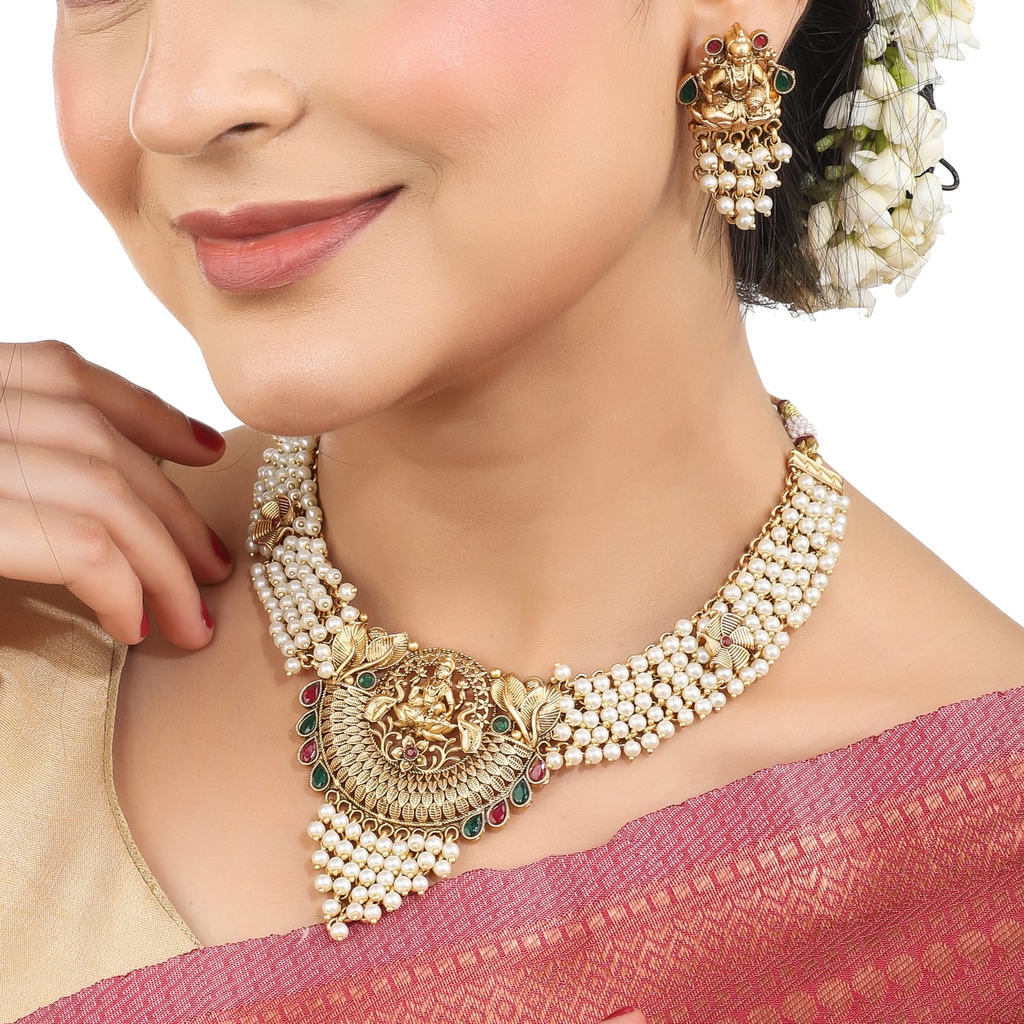 THE LAXMI MAA CRAFTED GOLD-TONE NECKLACE SET WITH WHITE PEARLS COMBINES DIVINE CRAFTSMANSHIP WITH ELEGANT DESIGN.