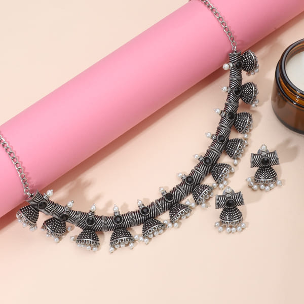 BLACK COLOR STONES STUDDED OXIDIZED NECKLACE SET WITH MATCHING EARRINGS.