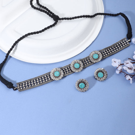 THIS OXIDIZED CHOKER SET. FEATURING INTRICATE DESIGNS AND AN ANTIQUE OXIDIZED FINISH,