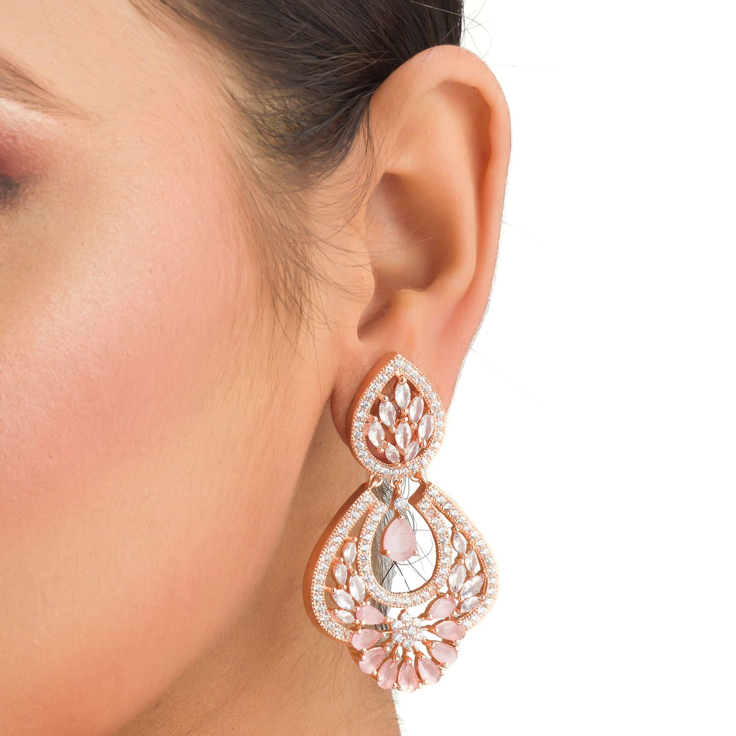 ZIRCON EARRINGS WITH ORCHID ZIRCON ON ROSE GOLD POLISH EXUDES A LUSH, ROMANTIC GLOW WITH REFINED ELEGANCE