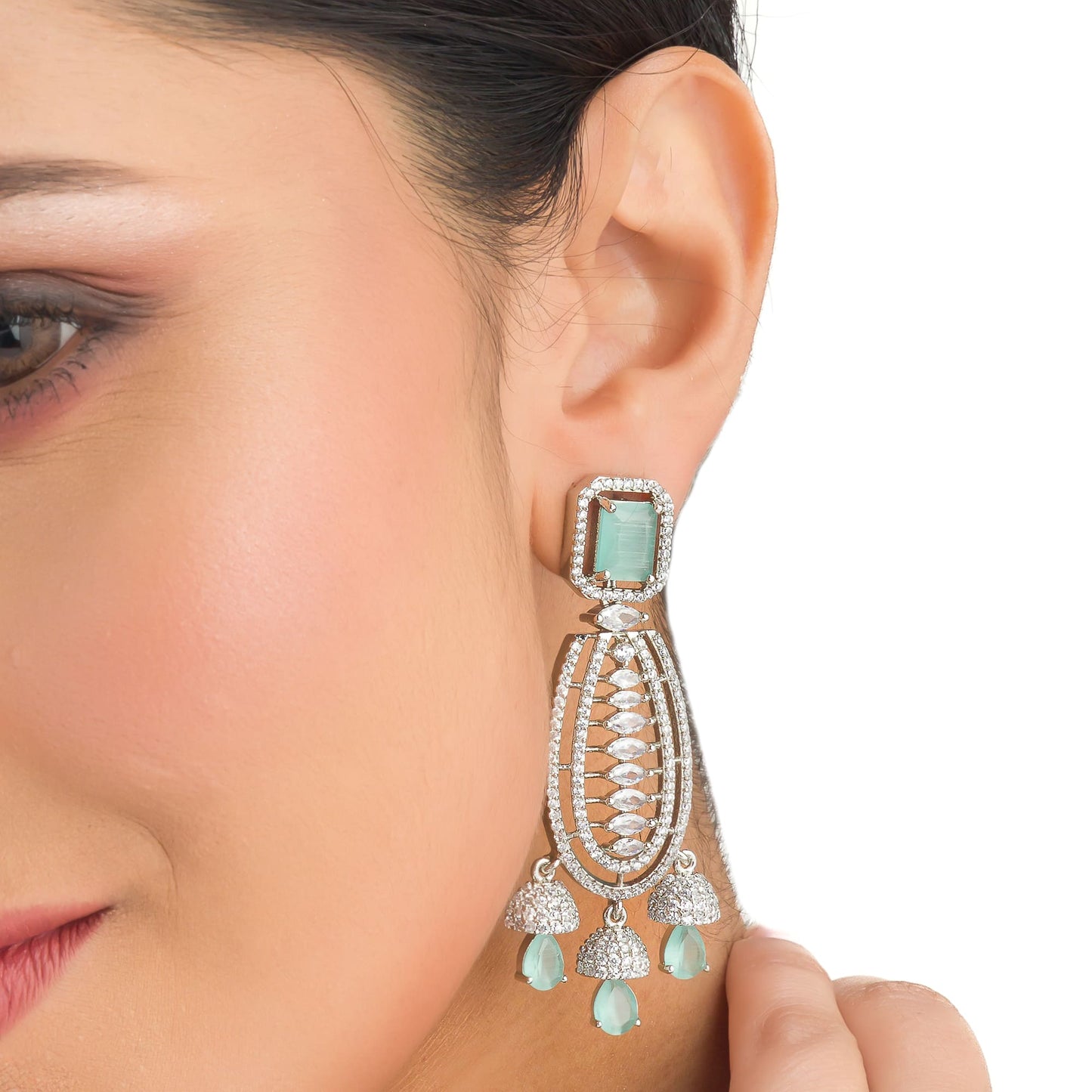 "TURQUOISE COLOURED ZIRCON  EARRINGS OFFER A STUNNING POP OF VIBRANT, OCEANIC COLOR AND ELEGANCE."