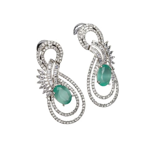 "TURQUOISE ZIRCON EARRINGS OFFER A STUNNING POP OF VIBRANT, OCEANIC COLOR AND ELEGANCE."