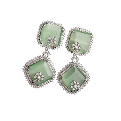 "LIGHT GREEN ZIRCON OFFERS A FRESH, DELICATE SPARKLE WITH A HINT OF SERENE ELEGANCE."