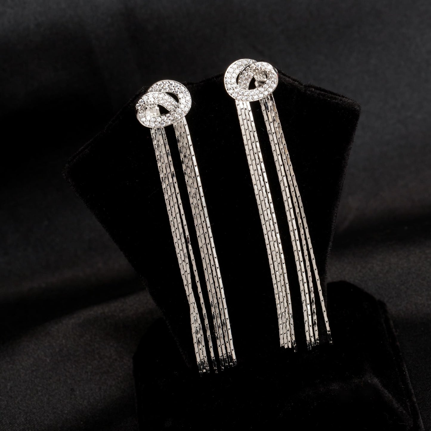 "TRENDY ZIRCON AND STAINLESS STEEL LONG EARRINGS COMBINE MODERN CHIC WITH SPARKLING ELEGANCE."