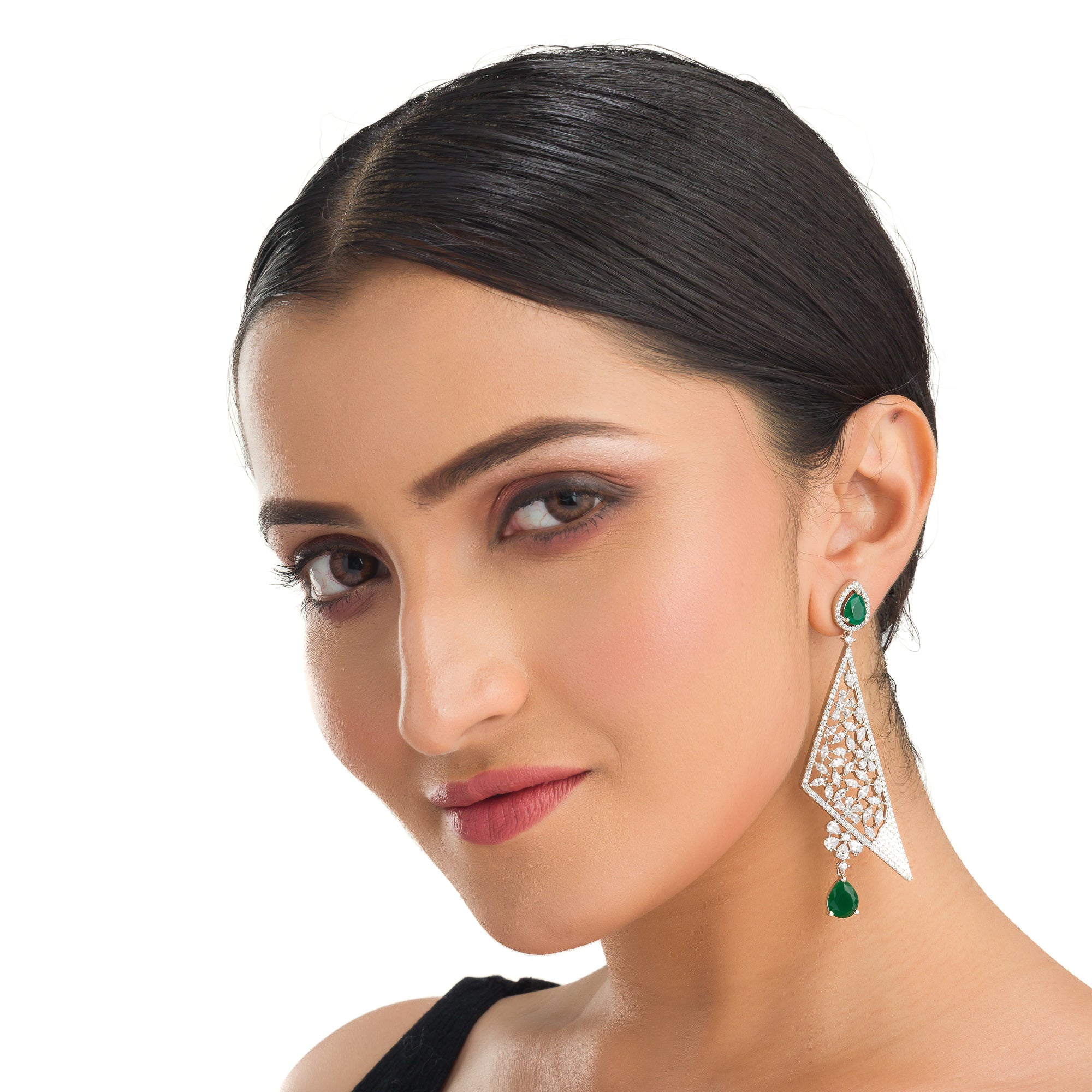 "Vibrant green zircon dangler earrings radiate rich, emerald-like sparkle and elegance."
