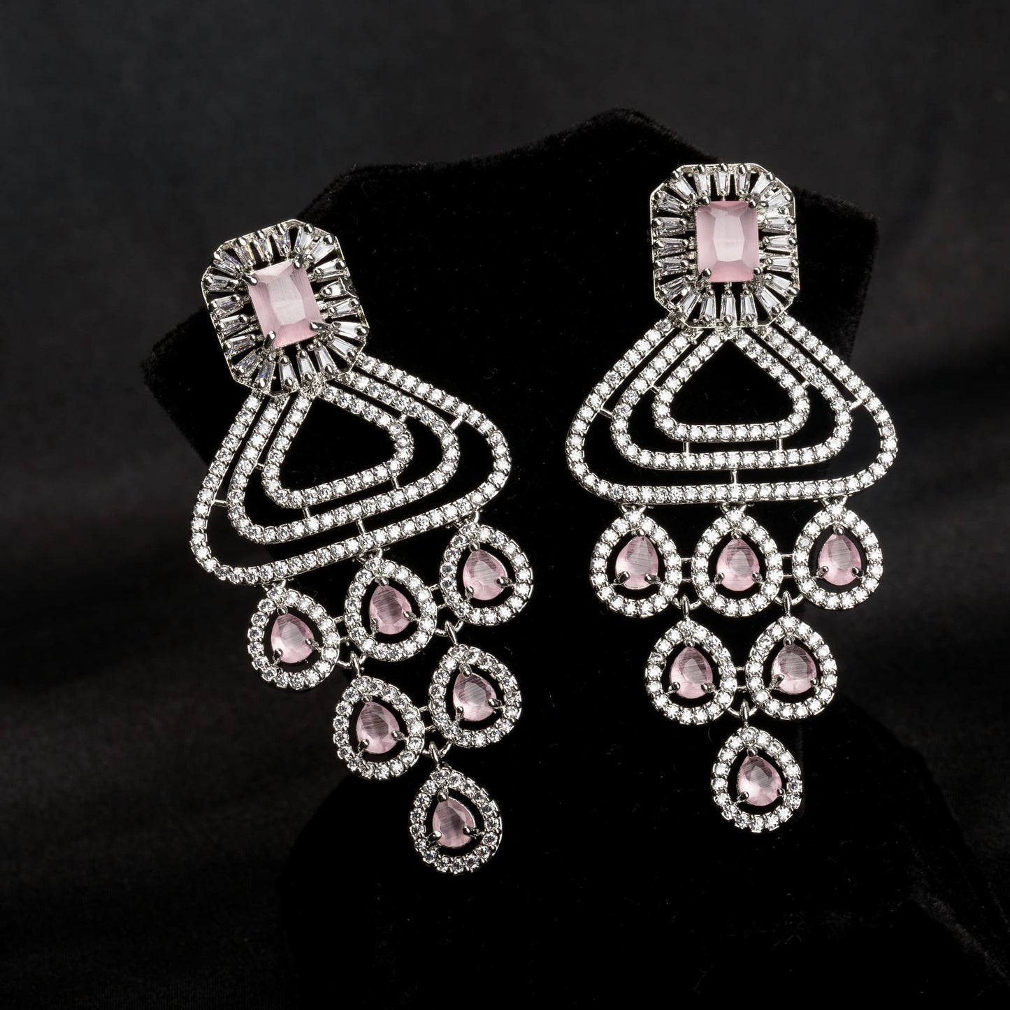 "GRACEFUL PINK LONG ZIRCON EARRINGS SHIMMER WITH TIMELESS ELEGANCE AND SOPHISTICATION."