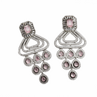 "Graceful pink long zircon earrings shimmer with timeless elegance and radiant sparkle."
