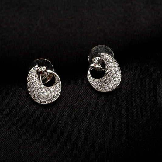 "ELEGANT PEACOCK-SHAPED ZIRCON STUDS ADD A TOUCH OF WHIMSICAL BEAUTY AND SPARKLE TO YOUR LOOK."