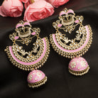 "Oversized pink jhumka with intricate detailing adds a bold, elegant touch to any outfit."
