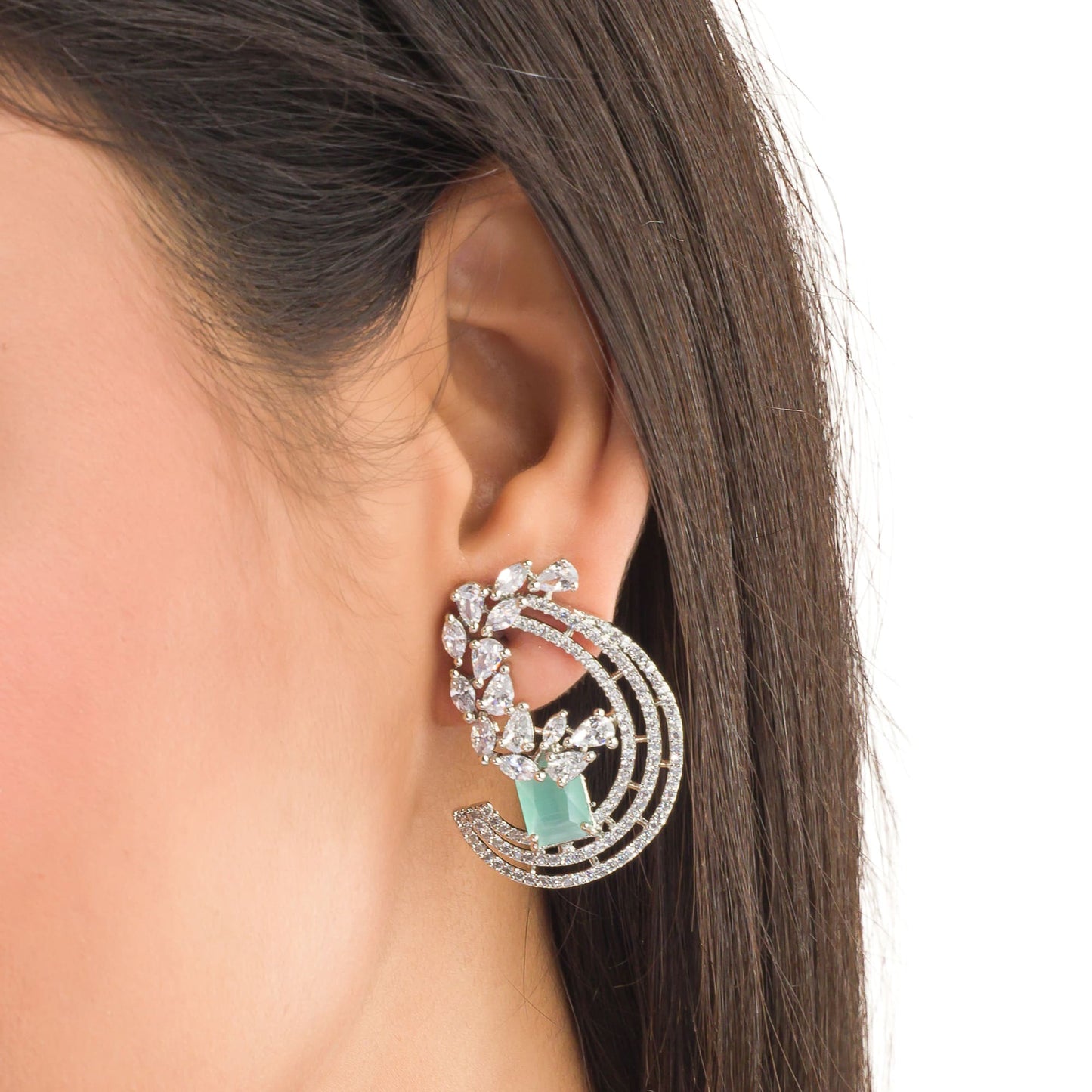 "STUNNING ZIRCON EARRINGS WITH A CAPTIVATING TURQUOISE  HUE ADD A TOUCH OF ELEGANCE AND SPARKLE TO ANY OUTFIT."