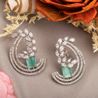 "Stunning turquoise zircon earrings add a touch of elegance and sparkle to any outfit."
