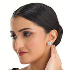 "Small zircon studs add a subtle, sparkling touch of elegance for everyday wear."
